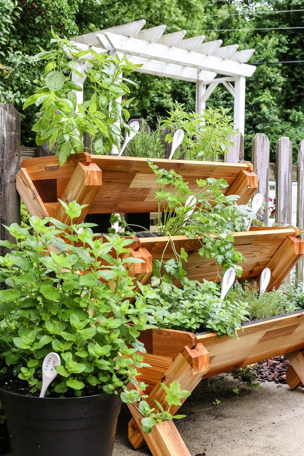 DIY Wooden Spoon Garden Markers | unigumushane.com - A simple tutorial for how to craft your own vintage-inspired garden markers made from wooden spoons, plus a resource for a beautiful stacked herb garden.