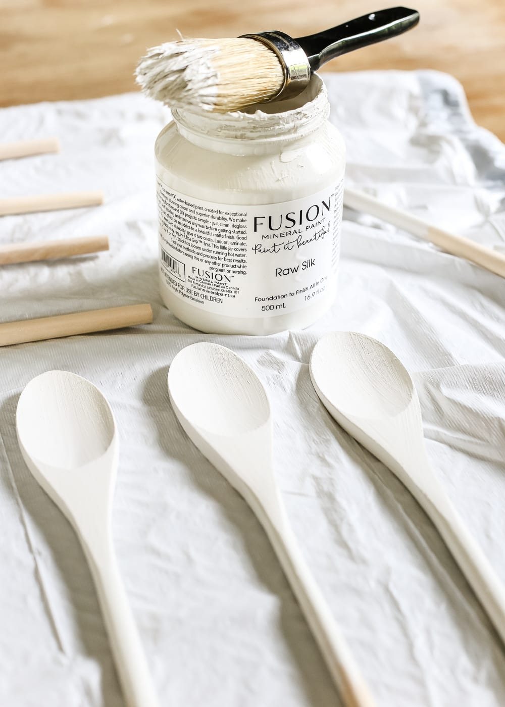 DIY Wooden Spoon Garden Markers | unigumushane.com - A simple tutorial for how to craft your own vintage-inspired garden markers made from wooden spoons, plus a resource for a beautiful stacked herb garden.