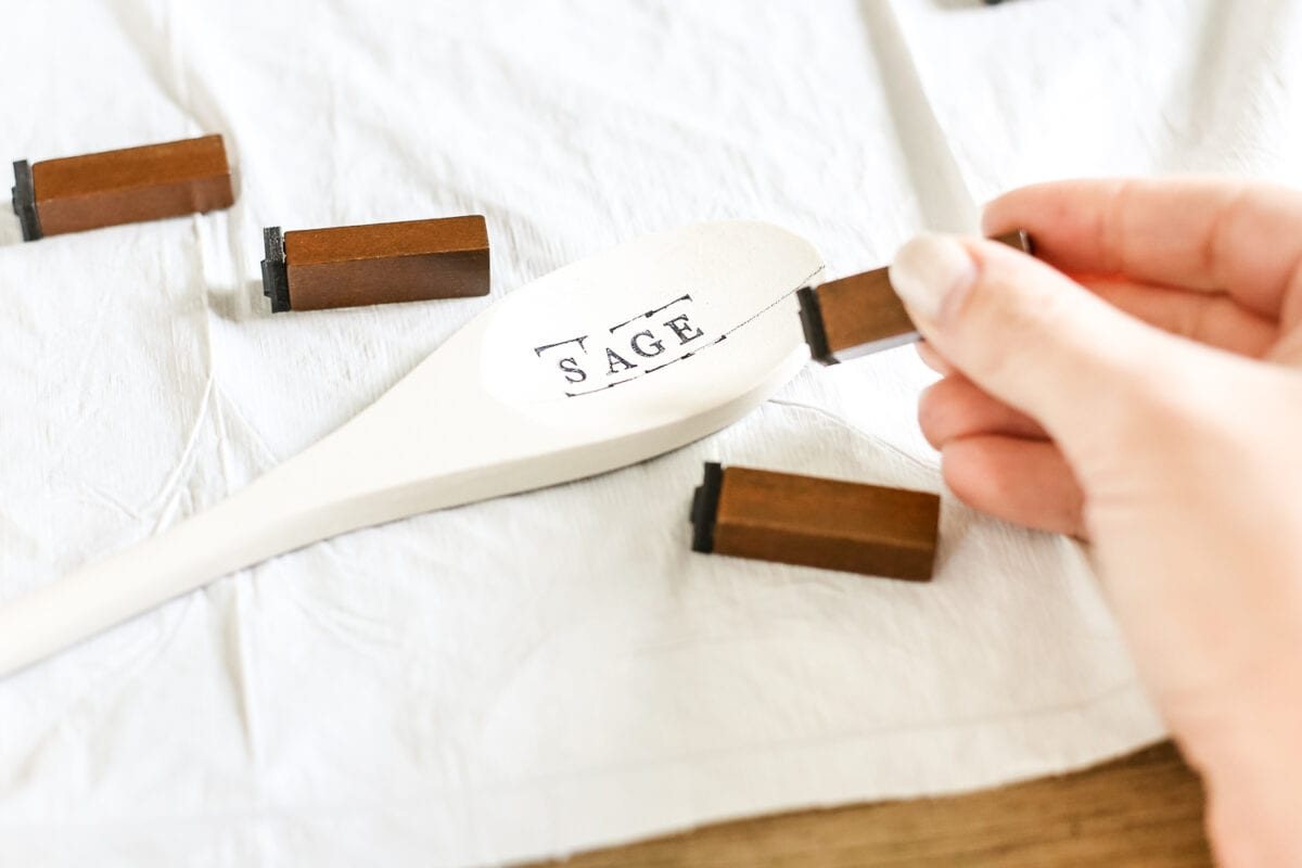 DIY Wooden Spoon Garden Markers | unigumushane.com - A simple tutorial for how to craft your own vintage-inspired garden markers made from wooden spoons, plus a resource for a beautiful stacked herb garden.