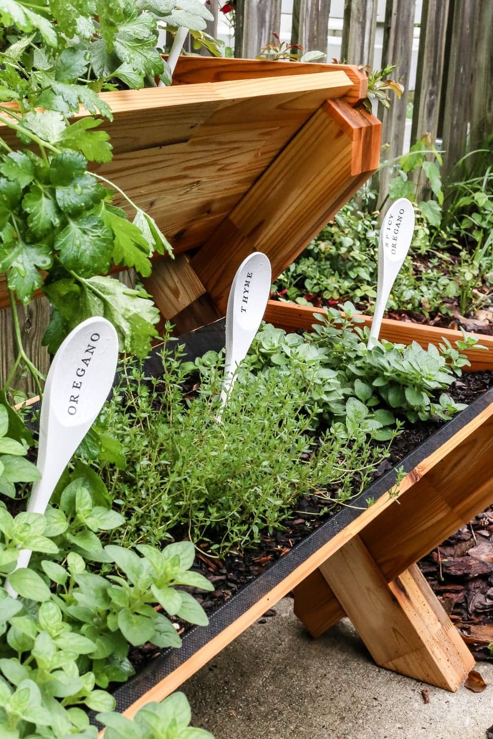 DIY Wooden Spoon Garden Markers | unigumushane.com - A simple tutorial for how to craft your own vintage-inspired garden markers made from wooden spoons, plus a resource for a beautiful stacked herb garden.
