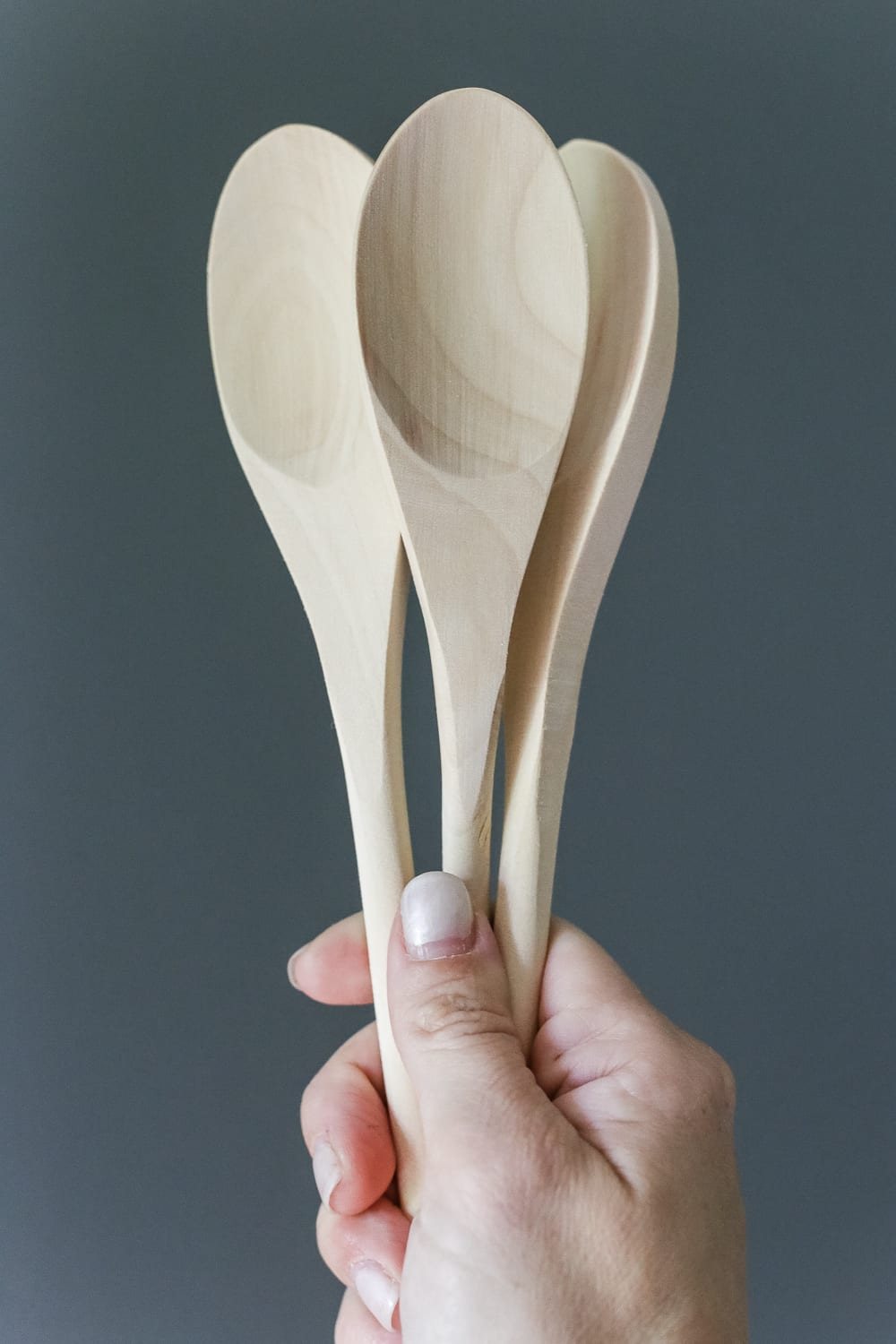 DIY Wooden Spoon Garden Markers | unigumushane.com - A simple tutorial for how to craft your own vintage-inspired garden markers made from wooden spoons, plus a resource for a beautiful stacked herb garden.