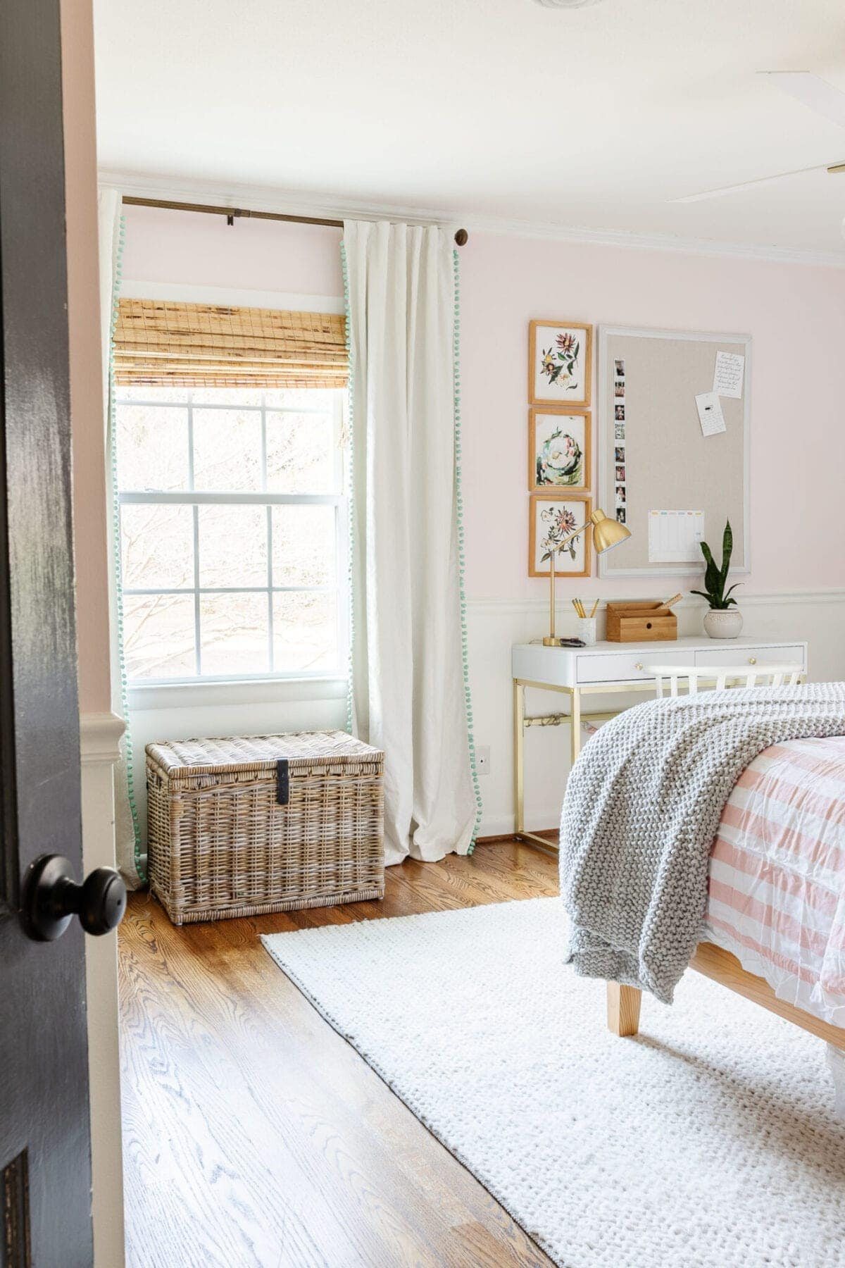 pom pom curtains in a girl's bedroom
