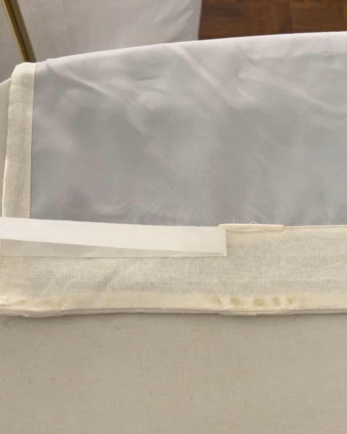 removing paper from hemming tape to iron