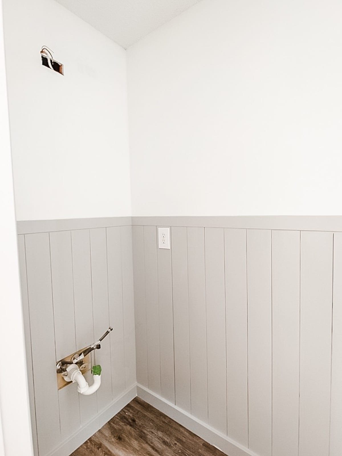 Easy DIY Vertical Shiplap Wainscoting in a Bathroom