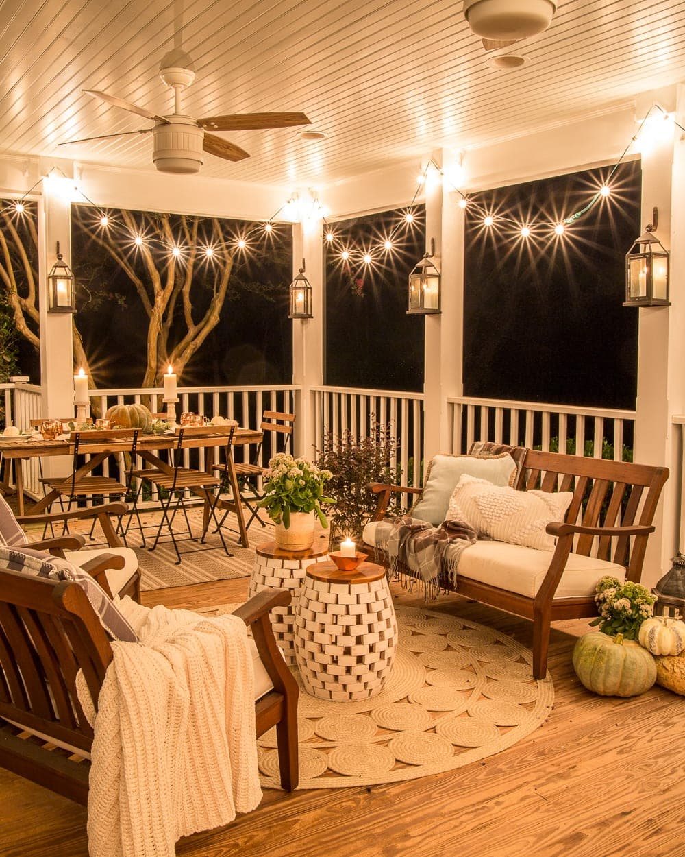 Fall Back Porch at Night | How to style your outdoor spaces for autumn using capsule decor items that will last throughout the seasons and get the most bang for your buck.