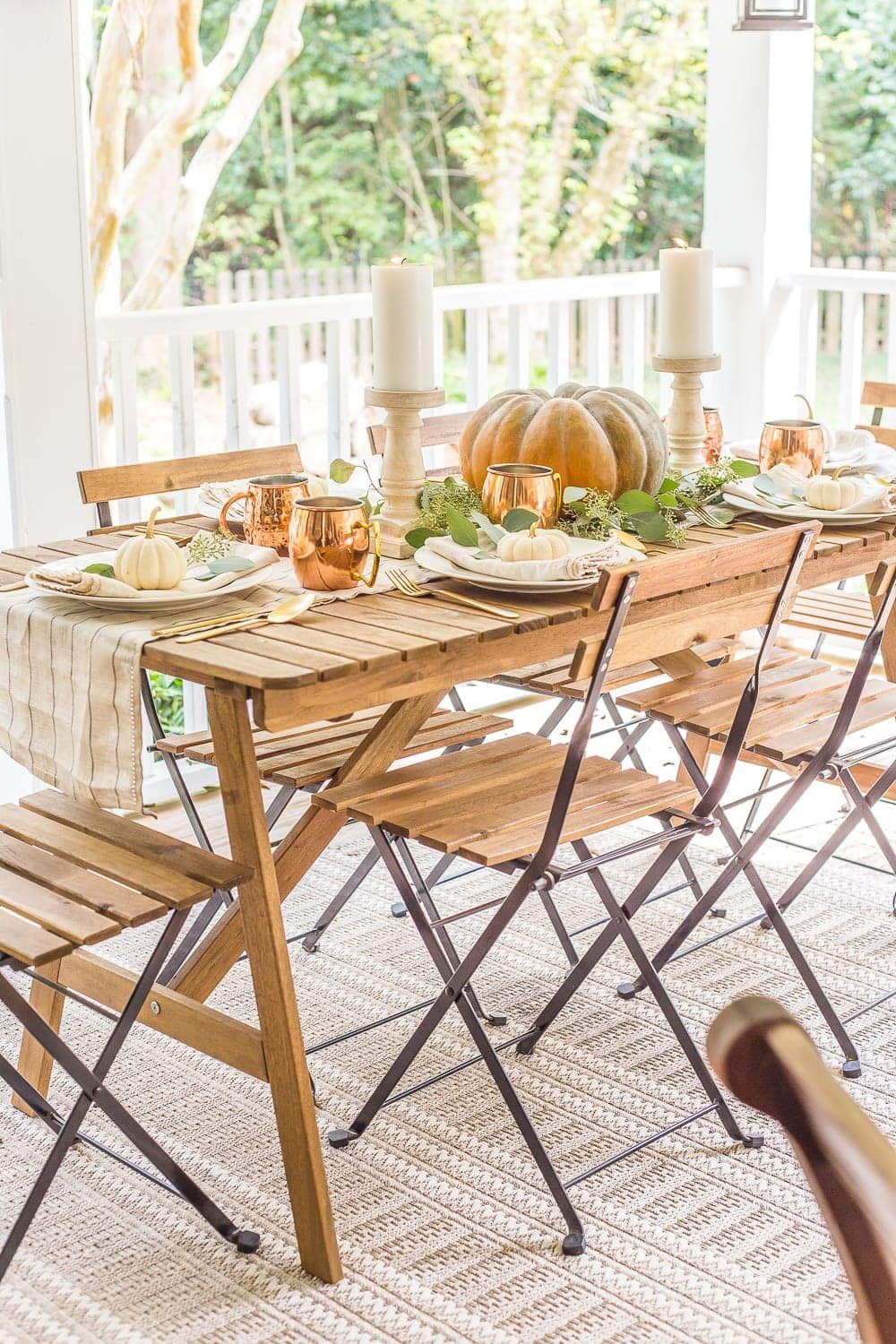 Fall Back Porch | How to style your outdoor spaces for autumn using capsule decor items that will last throughout the seasons and get the most bang for your buck.