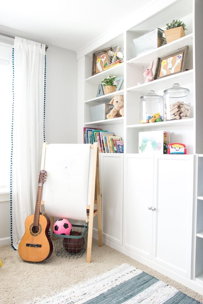 Eclectic Farmhouse Playroom Makeover | unigumushane.com - A boring and cluttered playroom gets a modern eclectic farmhouse makeover on a budget with DIY projects, smart storage solutions, and inexpensive finds. popular pin