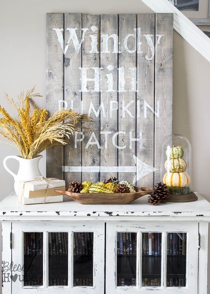 wood scraps turned into a rustic sign for diy wall decor