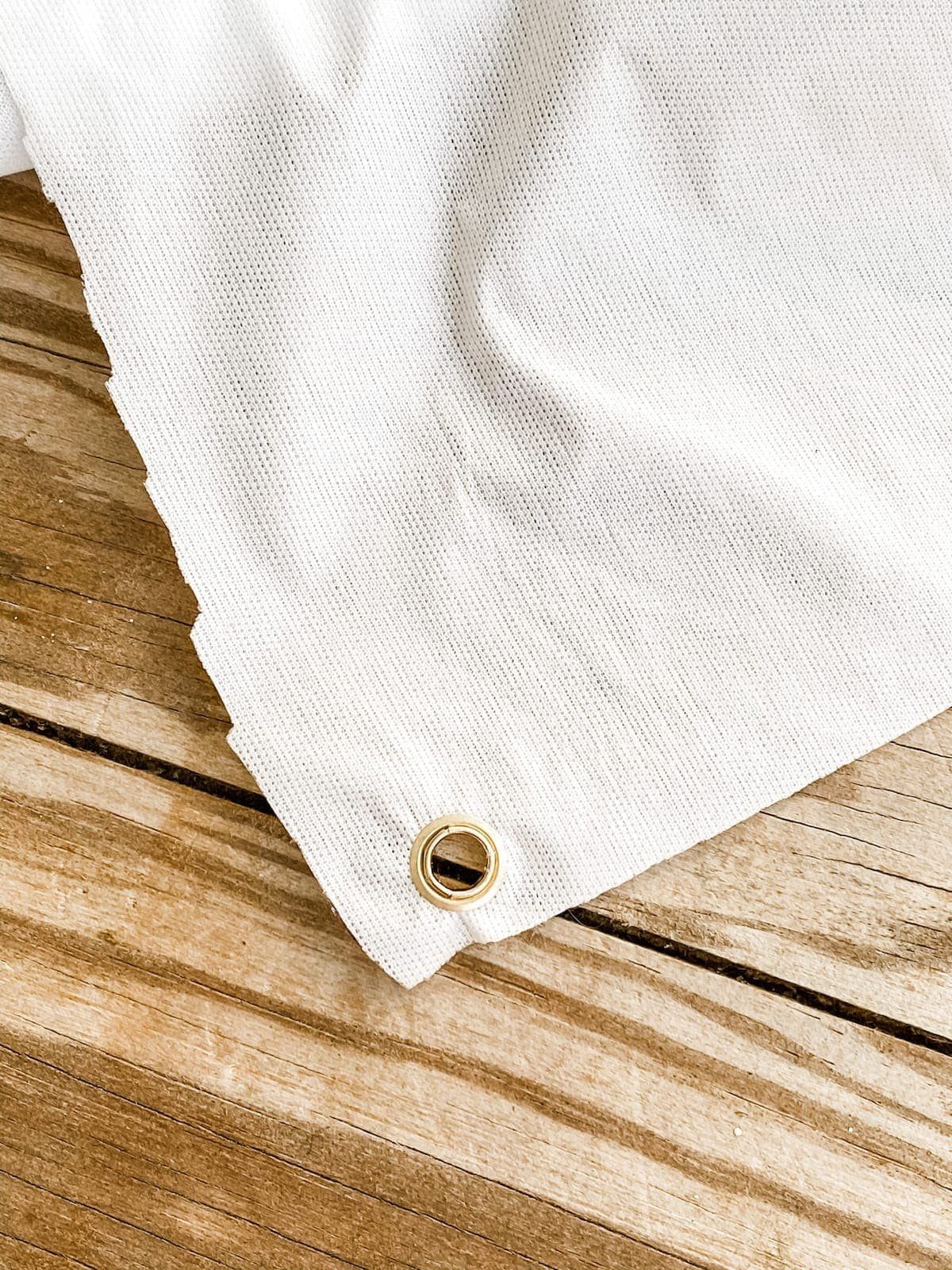 DIY outdoor movie screen from a shower curtain liner