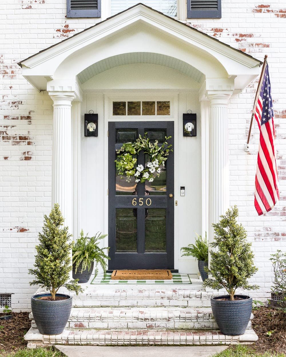 FAQs About Our Limewashed Brick | All of our frequently asked questions about our limewashed brick concerning neighbors' opinions, trends, DIY-ability, and why we chose it over paint. #limewash #brickexterior #limewashedbrick #brickpaint #paintedbrick #exteriormakeover #curbappeal #brickhouse