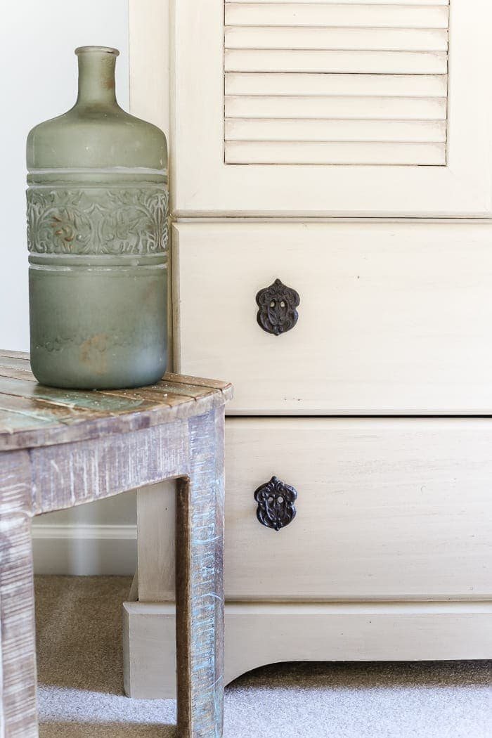 Faux Antique Shutter Armoire Makeover | unigumushane.com - A basic veneer cabinet gets a faux antique makeover using Fusion Mineral Paint in the color Plaster aged with Espresso wax and cast iron hardware.