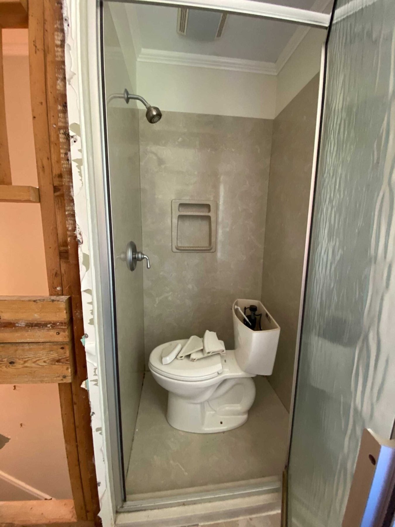 shower before with 80s beige shower surround