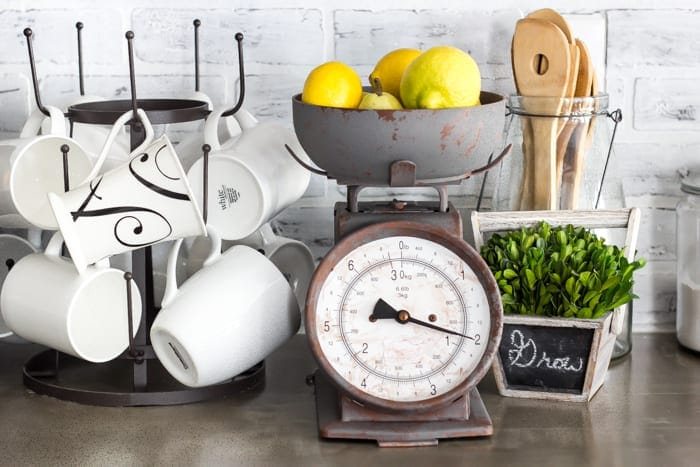 Faux Rusted Vintage Scale Makeover | unigumushane.com - How to create a faux rust finish with paint on a steel kitchen scale.