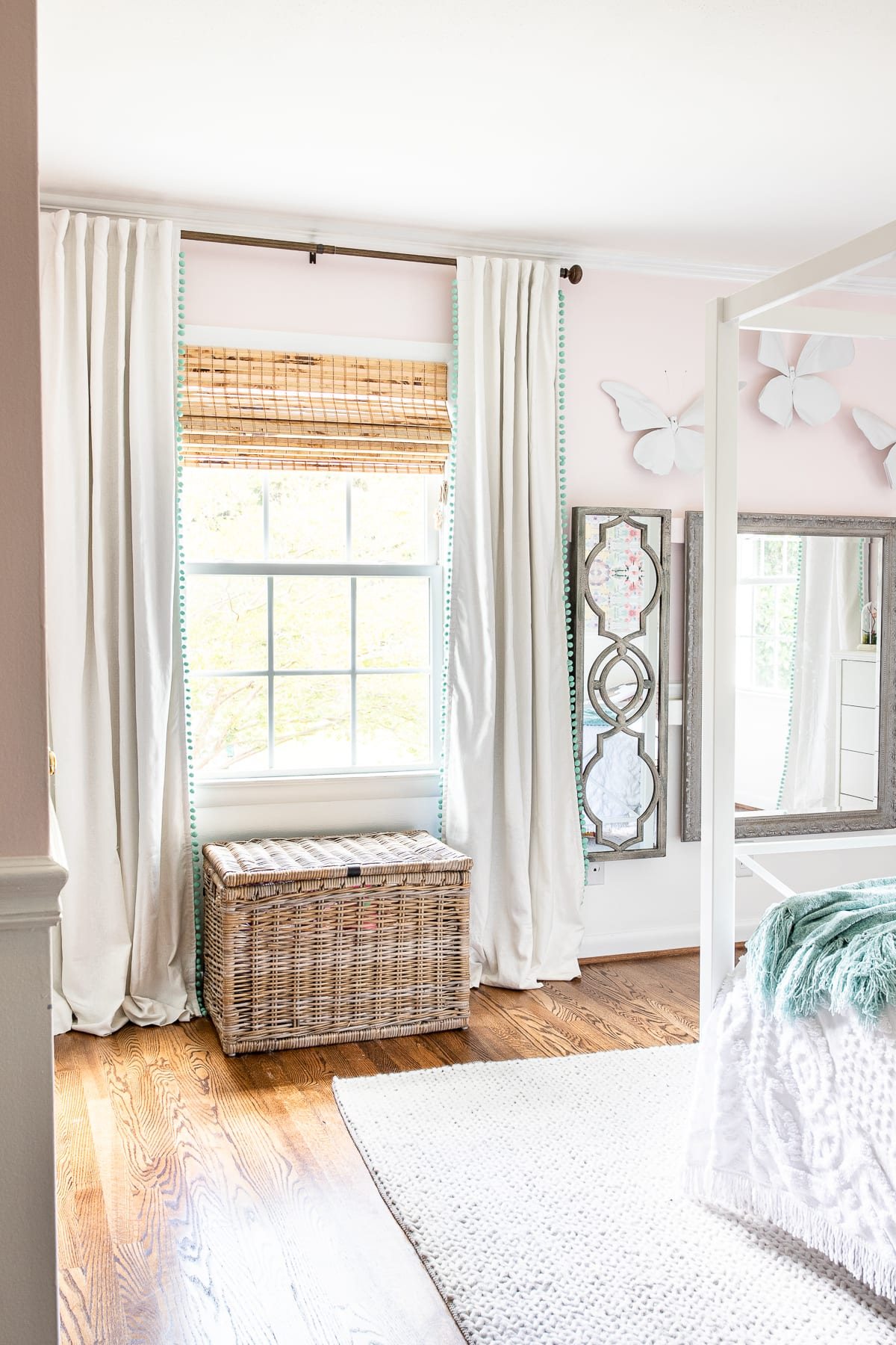 A guide for hanging curtains correctly to make windows appear larger and ceilings appear taller + favorite blackout curtains, shades, and rods for less.