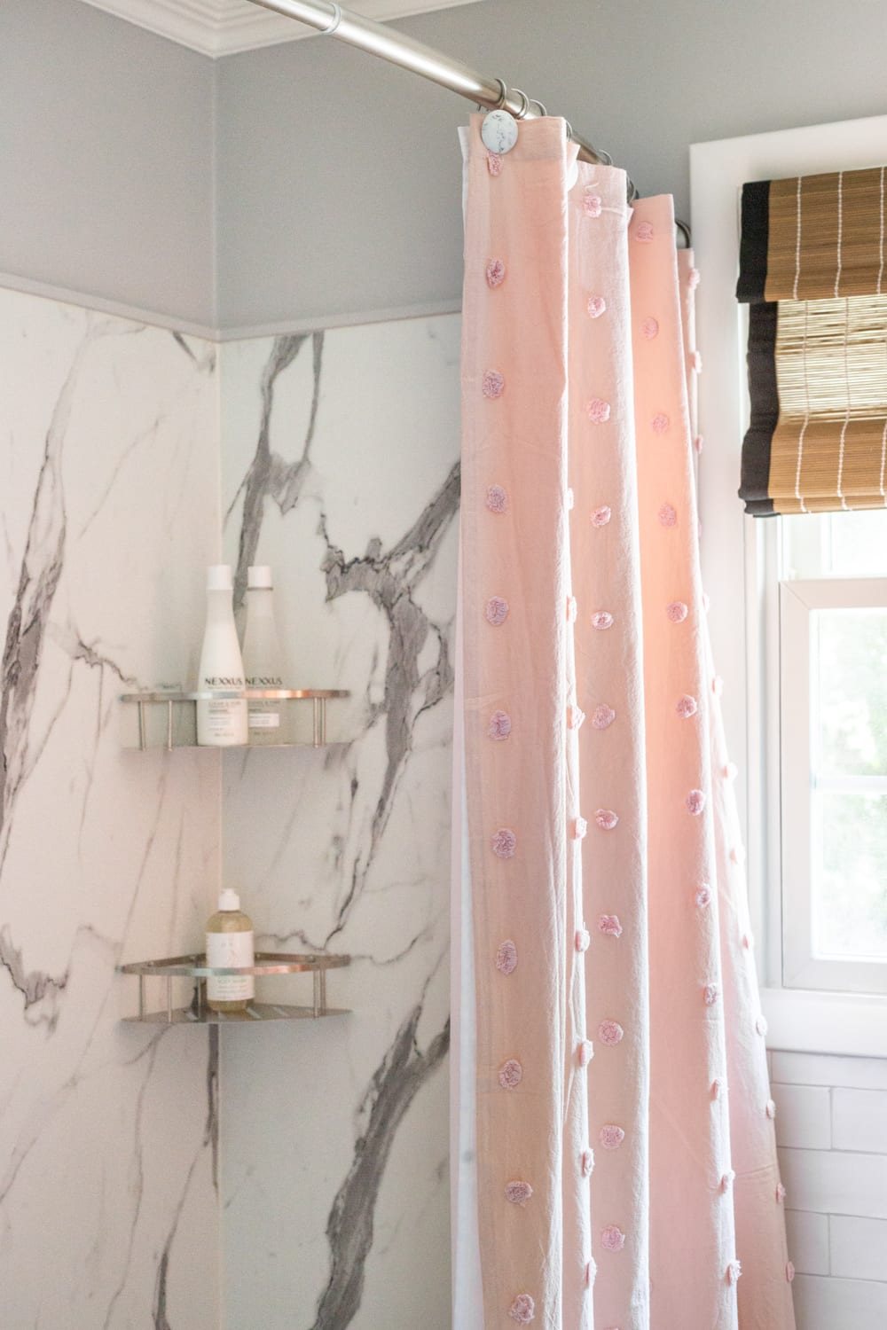 Girls' Bathroom Decor Details & Sources | Faux marble shower walls from American Standard Passage Collection