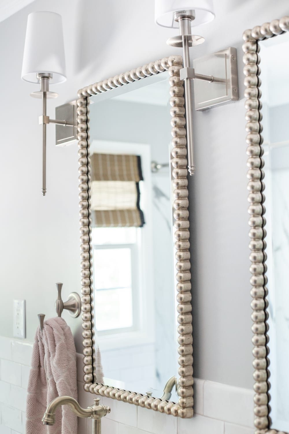 Girls' Bathroom Decor Details & Sources | brushed nickel beaded mirrors and shaded sconces