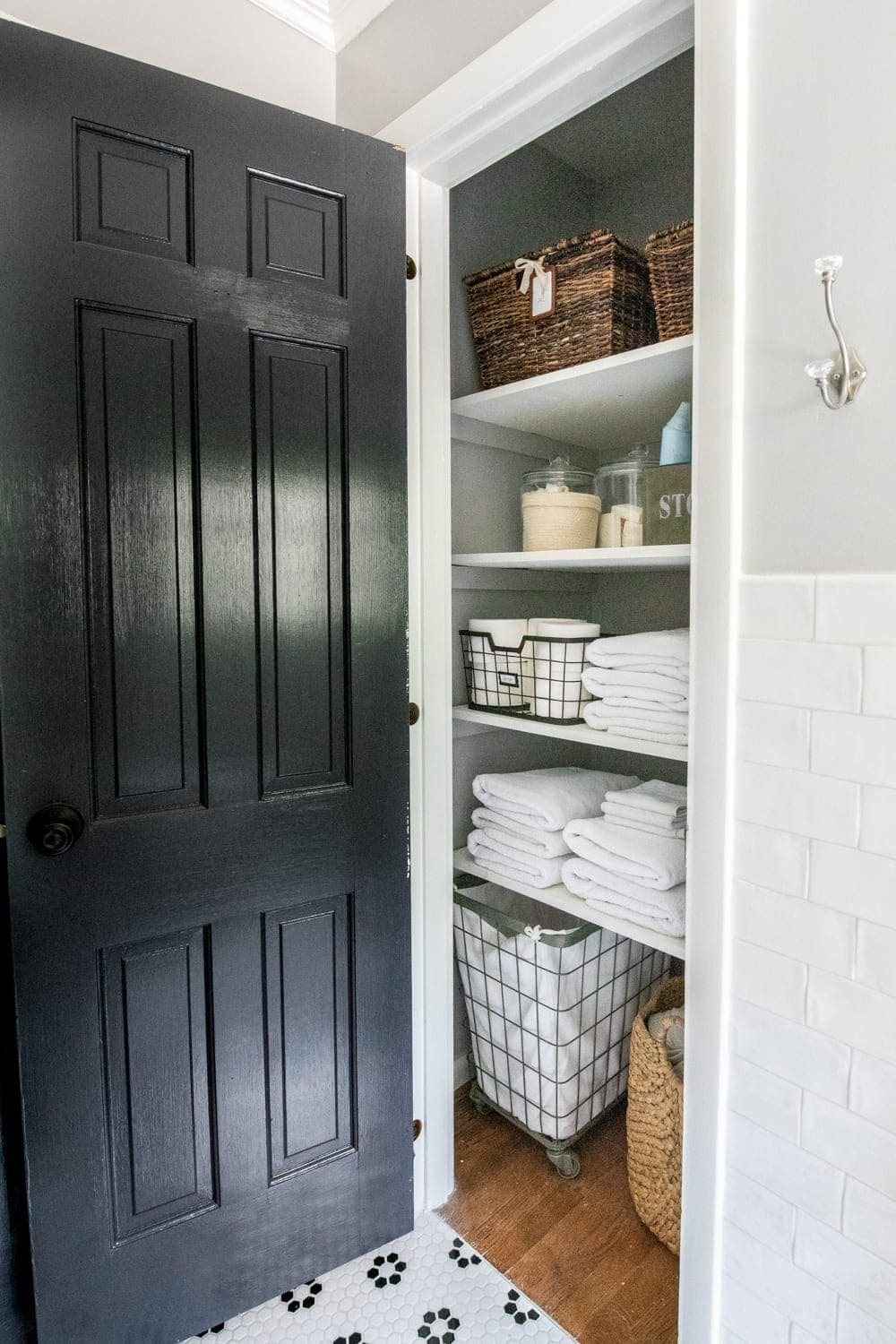 Whimsical, classic kids bathroom makeover | linen closet organization