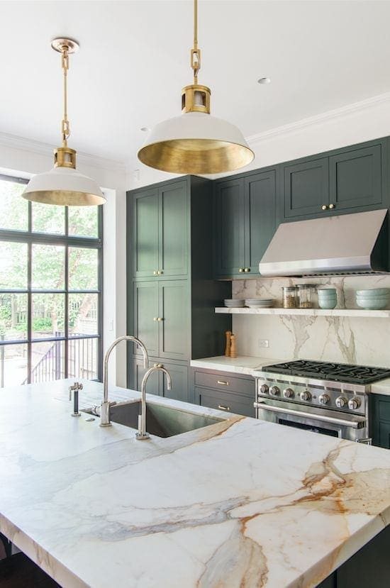A round-up of the best green kitchen cabinet paint colors for the hottest bold kitchen color trend. #greenkitchen #kitcheninspiration #paintcolors #greenpaint #kitcheninspiration #boldkitchen #greencabinets #greenpaintcolor #paintinspiration #kitchentrend
