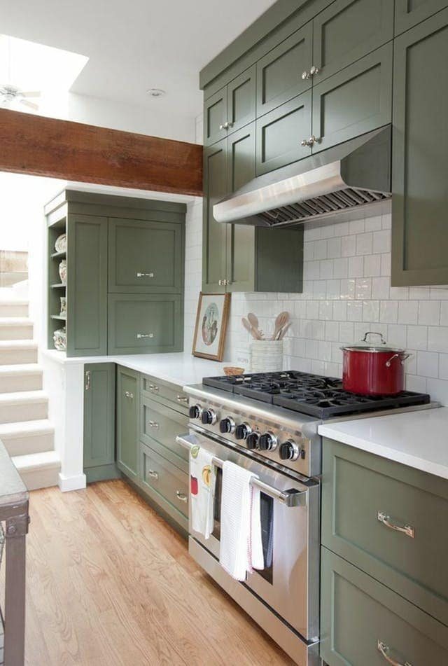 A round-up of the best green kitchen cabinet paint colors for the hottest bold kitchen color trend. #greenkitchen #kitcheninspiration #paintcolors #greenpaint #kitcheninspiration #boldkitchen #greencabinets #greenpaintcolor #paintinspiration #kitchentrend
