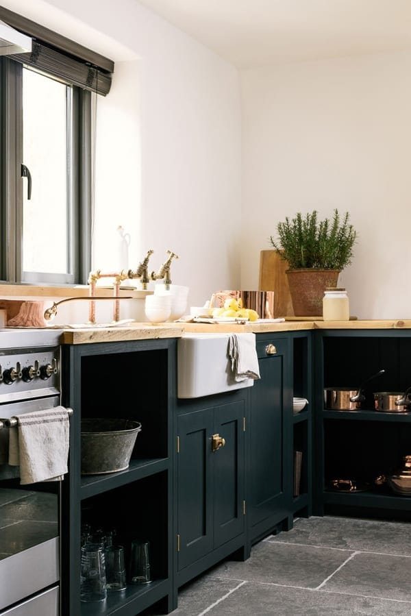 A round-up of the best green kitchen cabinet paint colors for the hottest bold kitchen color trend. #greenkitchen #kitcheninspiration #paintcolors #greenpaint #kitcheninspiration #boldkitchen #greencabinets #greenpaintcolor #paintinspiration #kitchentrend