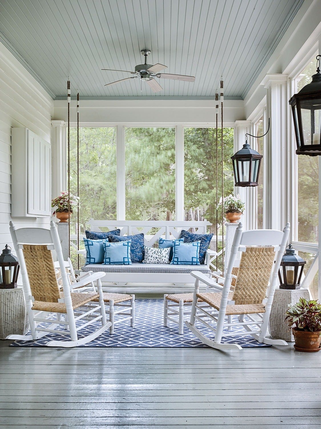 southern porch with bed swing and rocking chairs