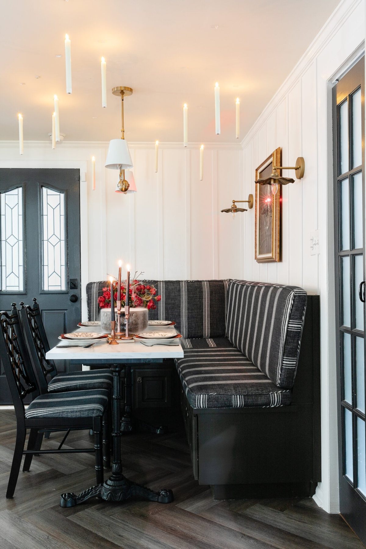 murder mystery dinner party banquette nook with floating candles