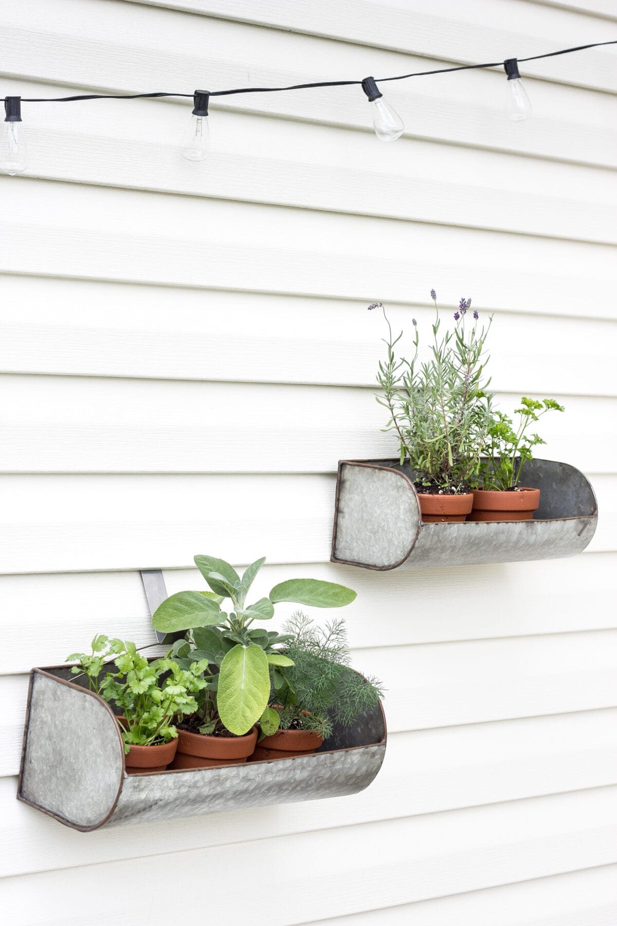 How to Decorate a Small Patio | unigumushane.com - Utilize a small patio space with chairs at each corner and a fire pit in the middle for function and entertainment. Add outdoor string lights for a cozy ambience.