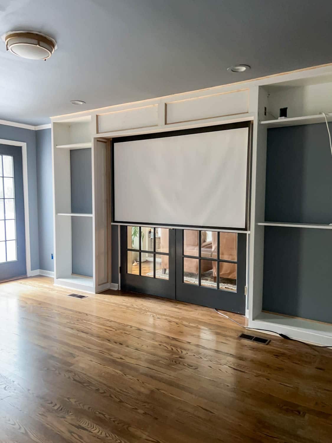 hidden built in projector screen in media room