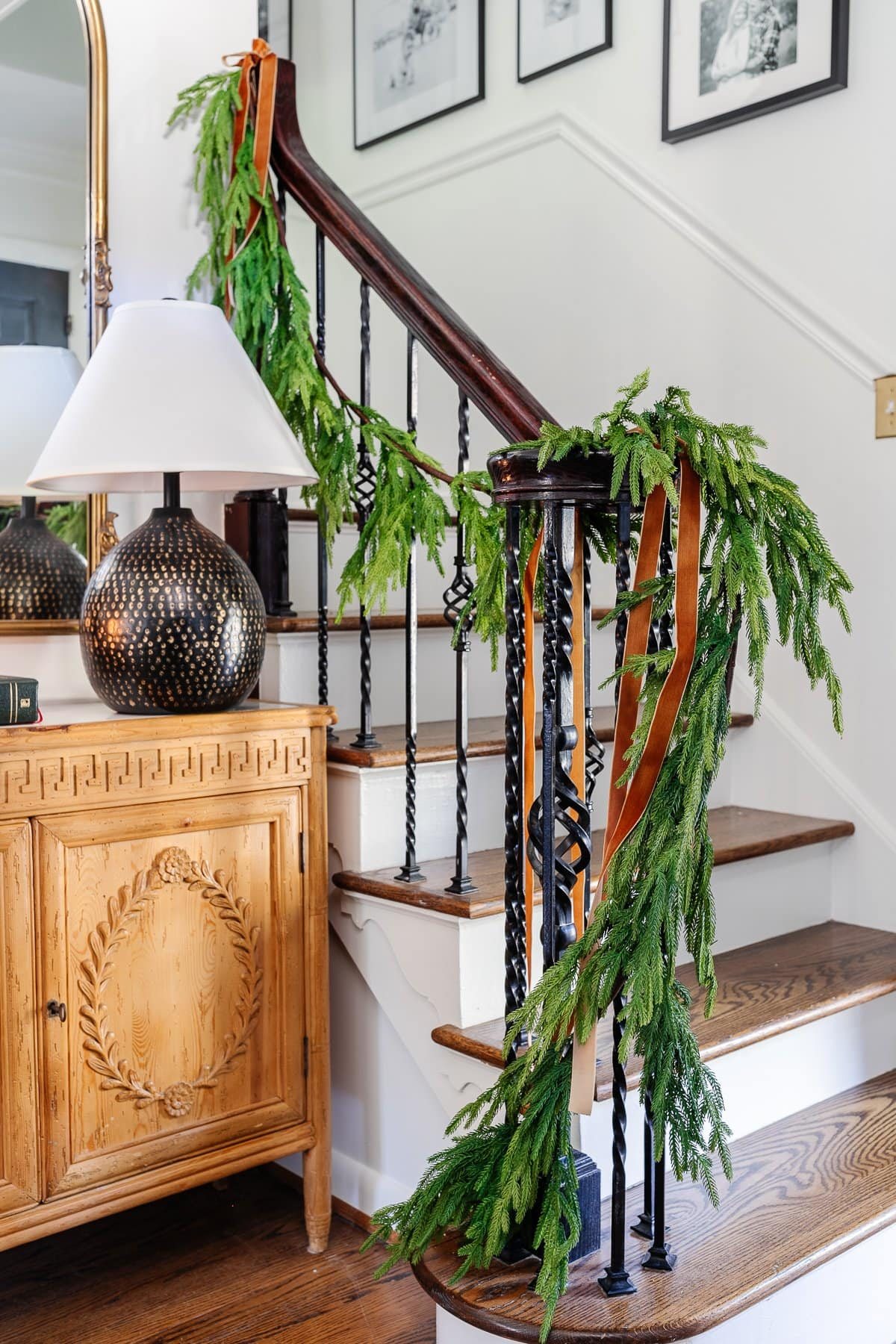 realistic garland on stairs for Christmas decor