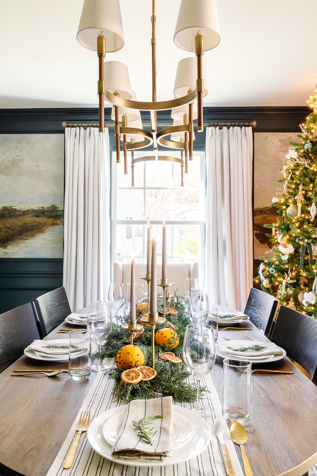 Christmas centerpiece using branches and oranges