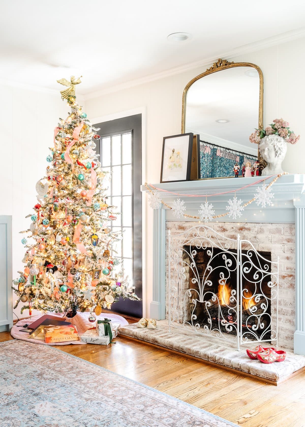 blue and pink Christmas decor with family ornaments