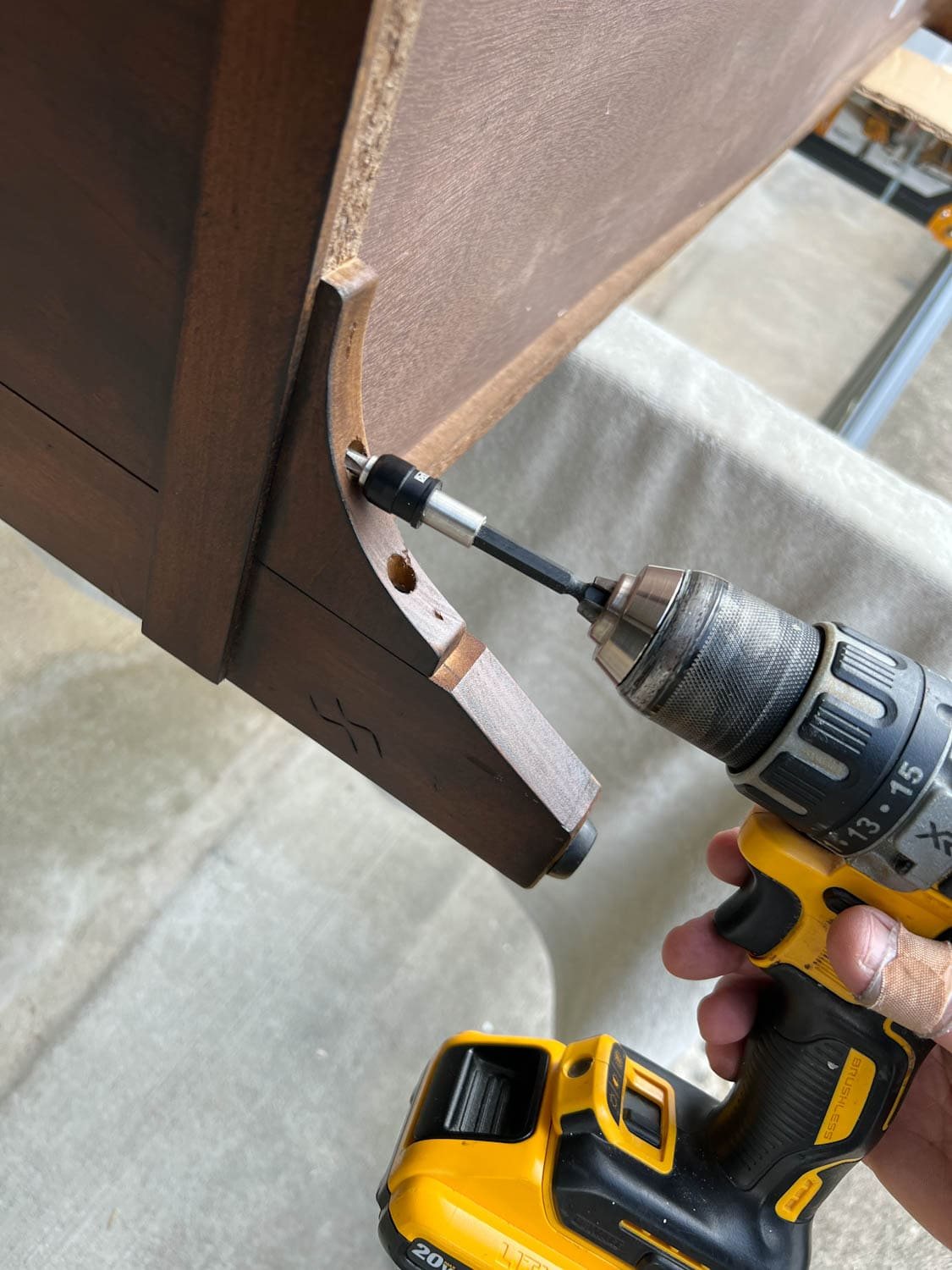 removing furniture legs to replace with new legs