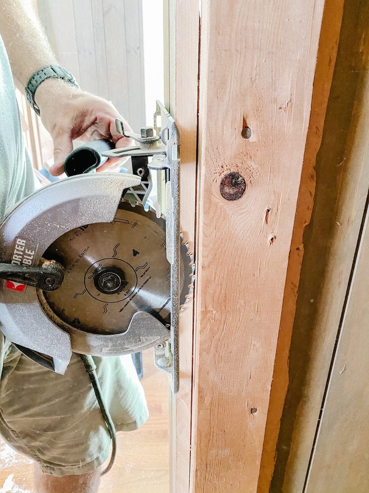 circular saw cutting closets open for built-in shelving