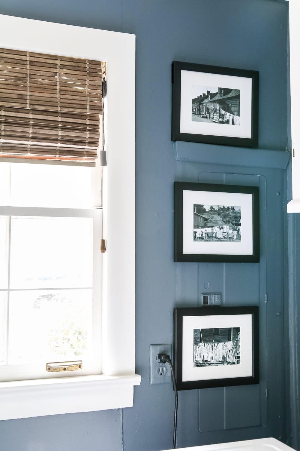 High Contrast Laundry Room Makeover | unigumushane.com - A dingy and dated laundry room gets a high contrast navy and white makeover packed with organizational strategies and budget-conscious DIY projects.