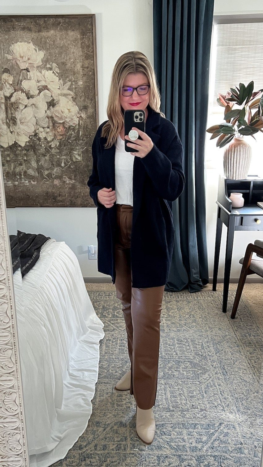 postpartum outfit with leather pants, tee, and cardigan