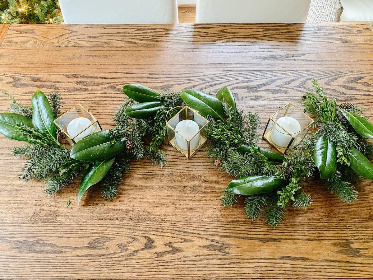 How to make cheap Christmas garland look high-end with magnolia leaves and boxwood stems