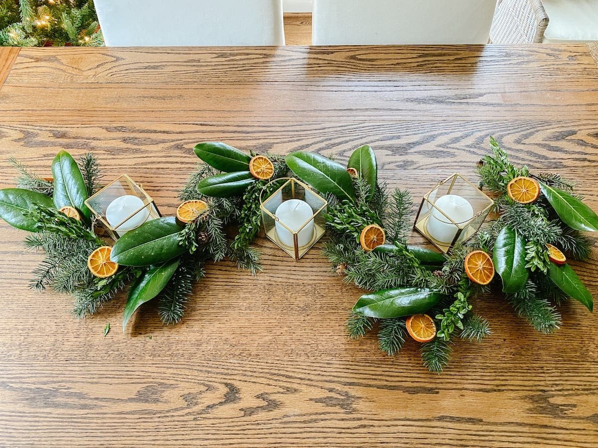 How to make cheap Christmas garland look high-end with magnolia, boxwoods, and dried oranges