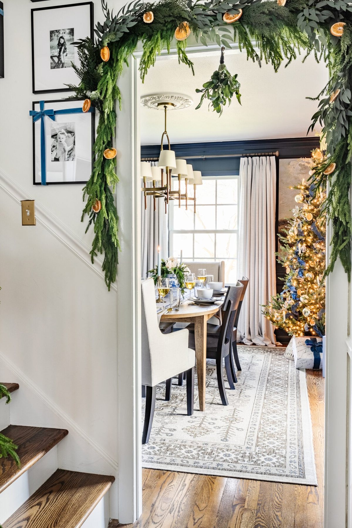 garland with dried orange slices around doorway for Christmas