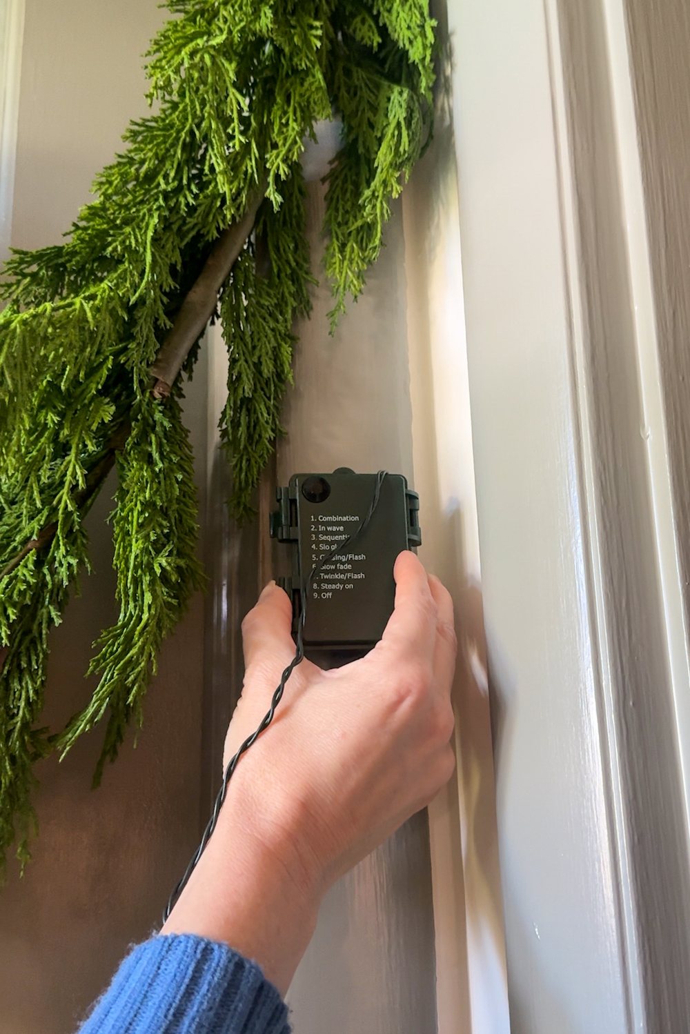 how to hang doorway garland inside with no damage for Christmas