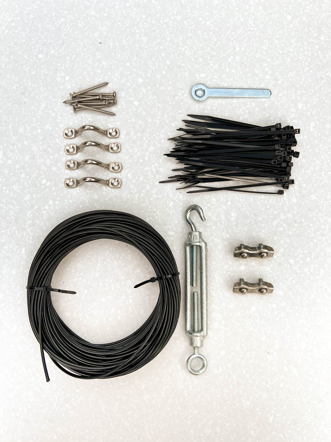 a light mounting kit with a cable, zip ties, and hardware