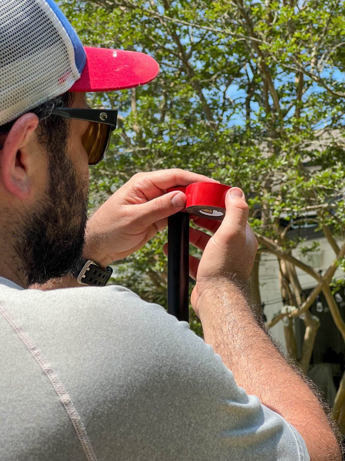 attaching squeeze connectors to light poles using mounting tape