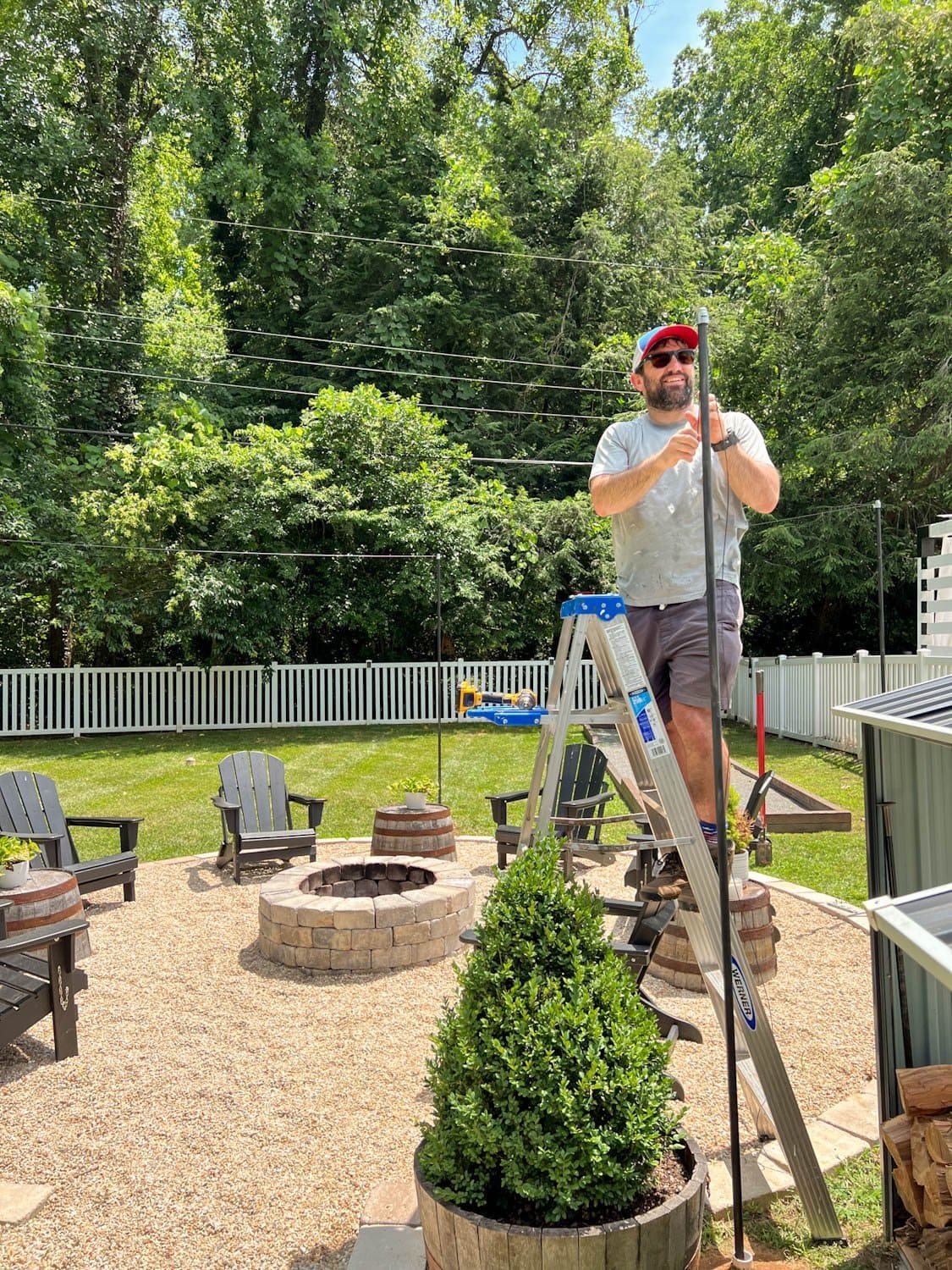 attaching a cable system to DIY string light poles for stability