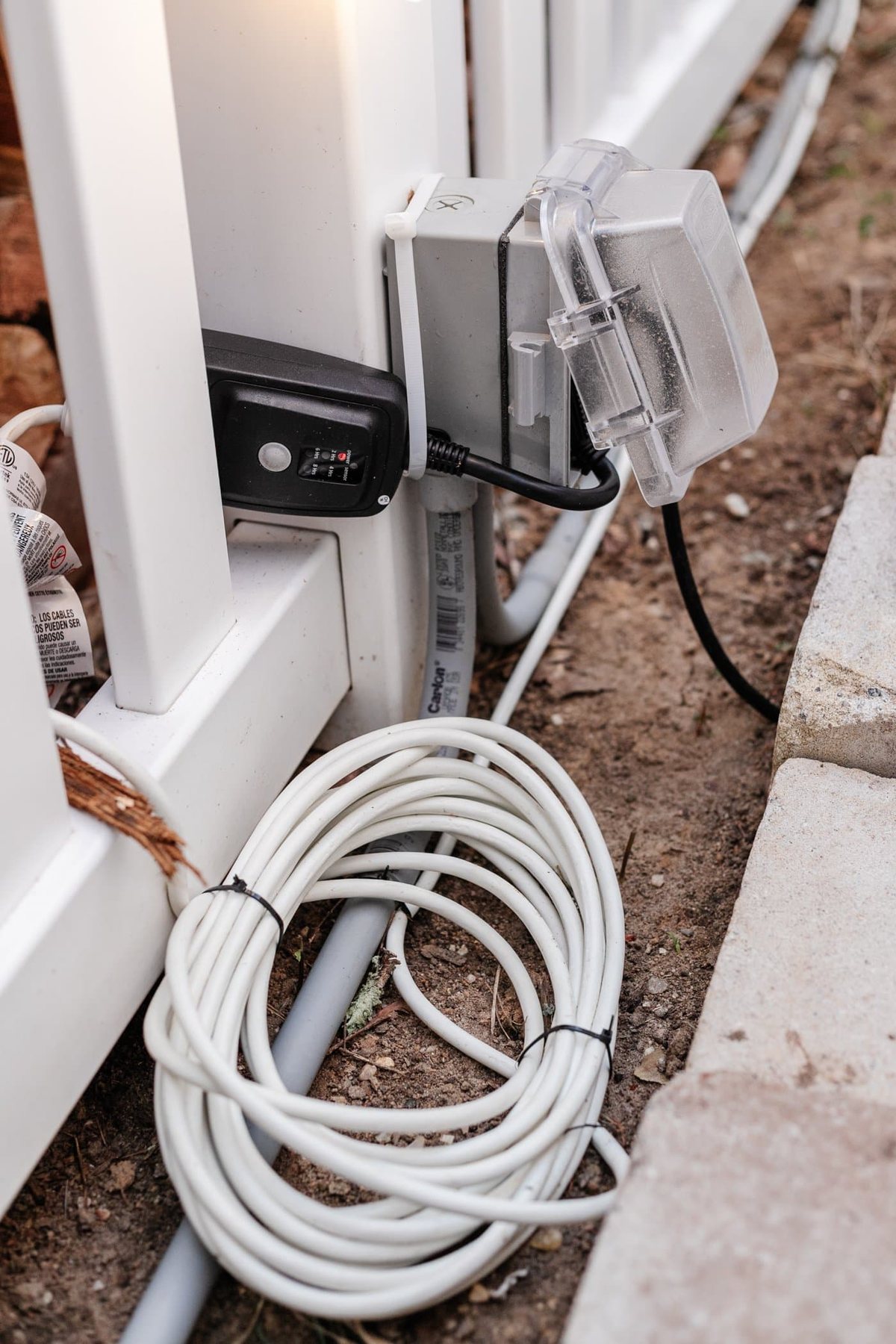outdoor outlet, outdoor timer, and extension cord