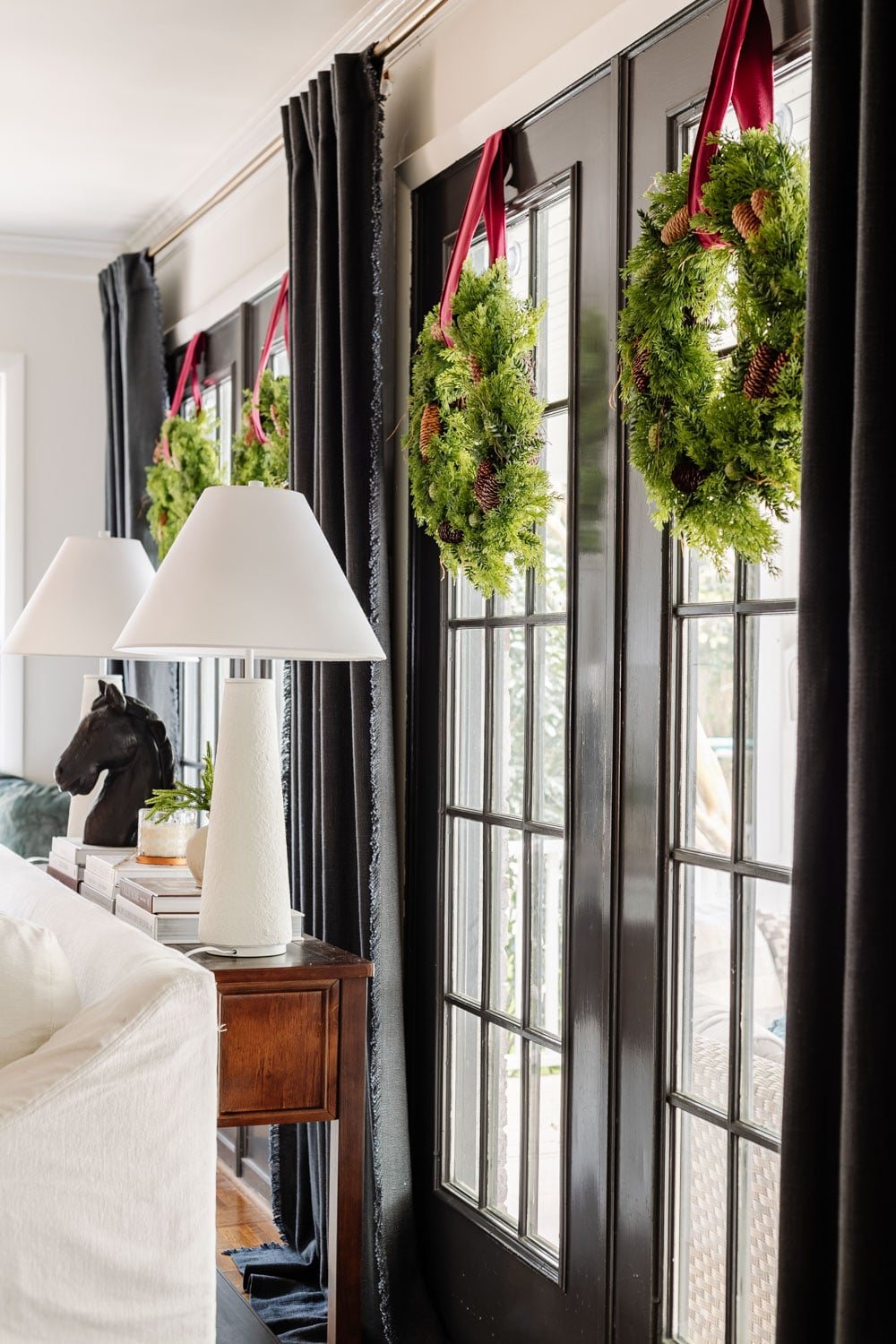 hanging wreaths on windows for christmas