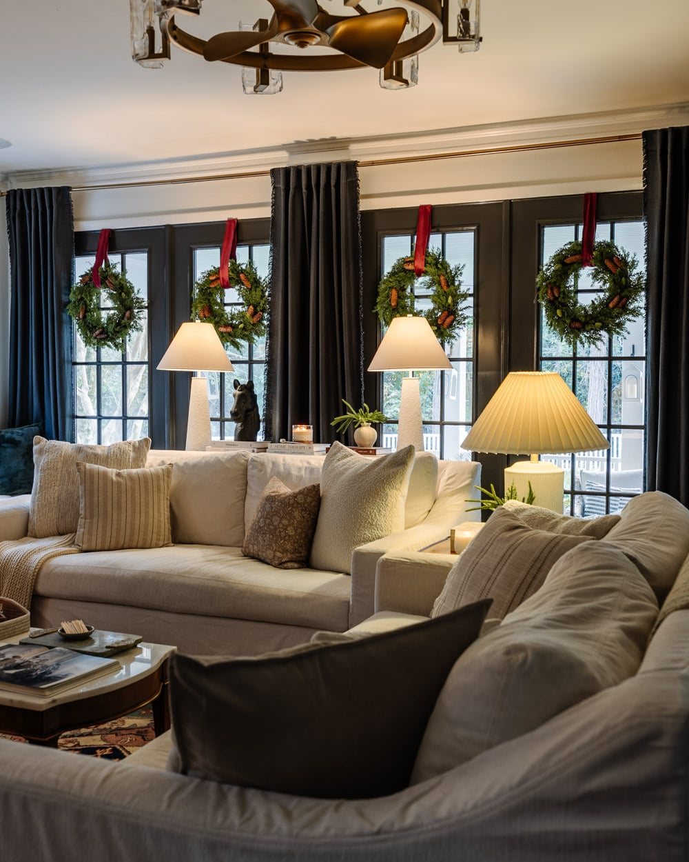 hanging window wreaths as living room Christmas decor