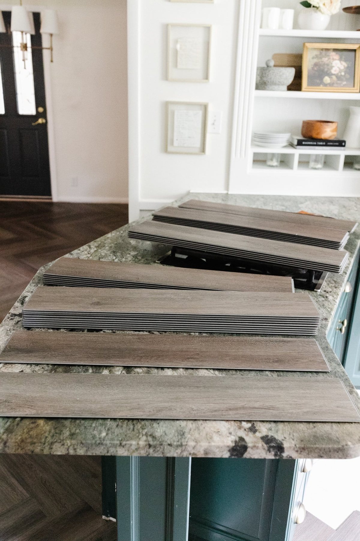 LVP flooring stacked to vary designs and patterns during installation