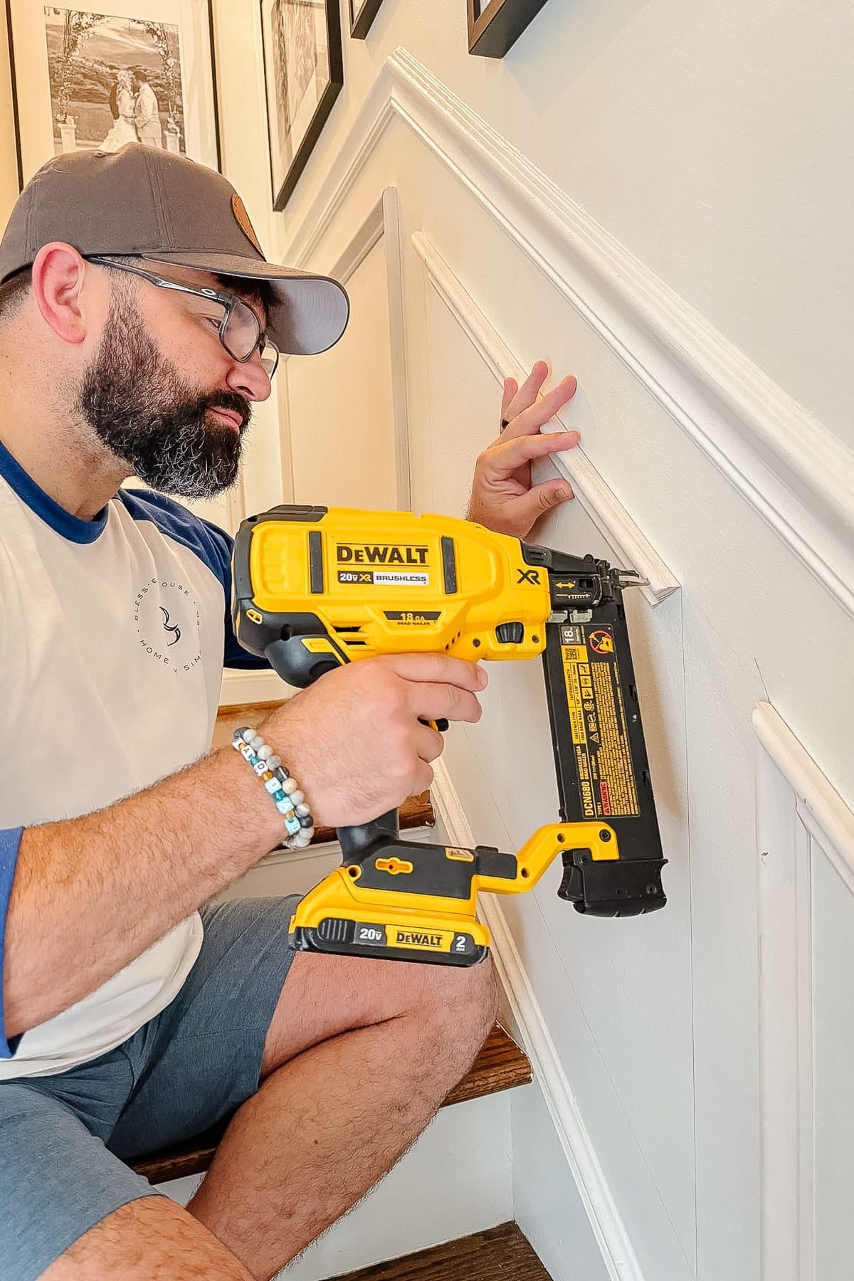 nailing molding cut at an angle on stairs