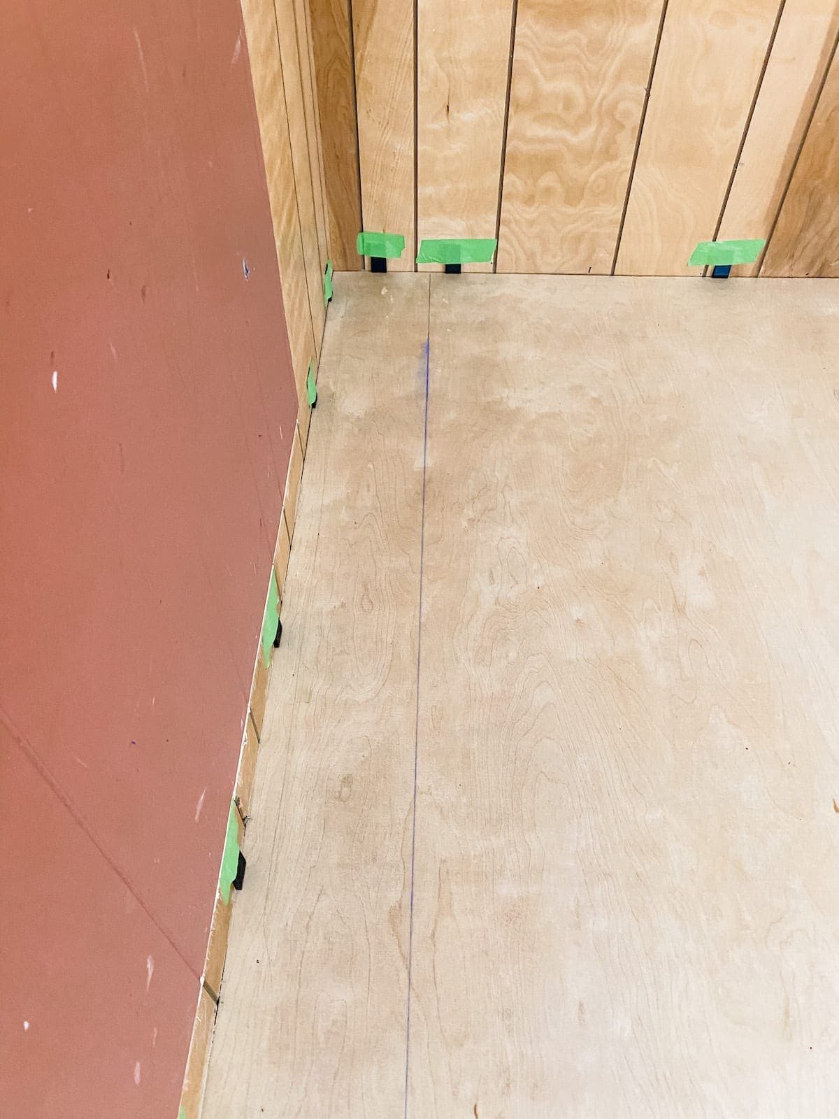Set a chalk line before installing the first row of luxury vinyl plank flooring to ensure a straight line as the starting point