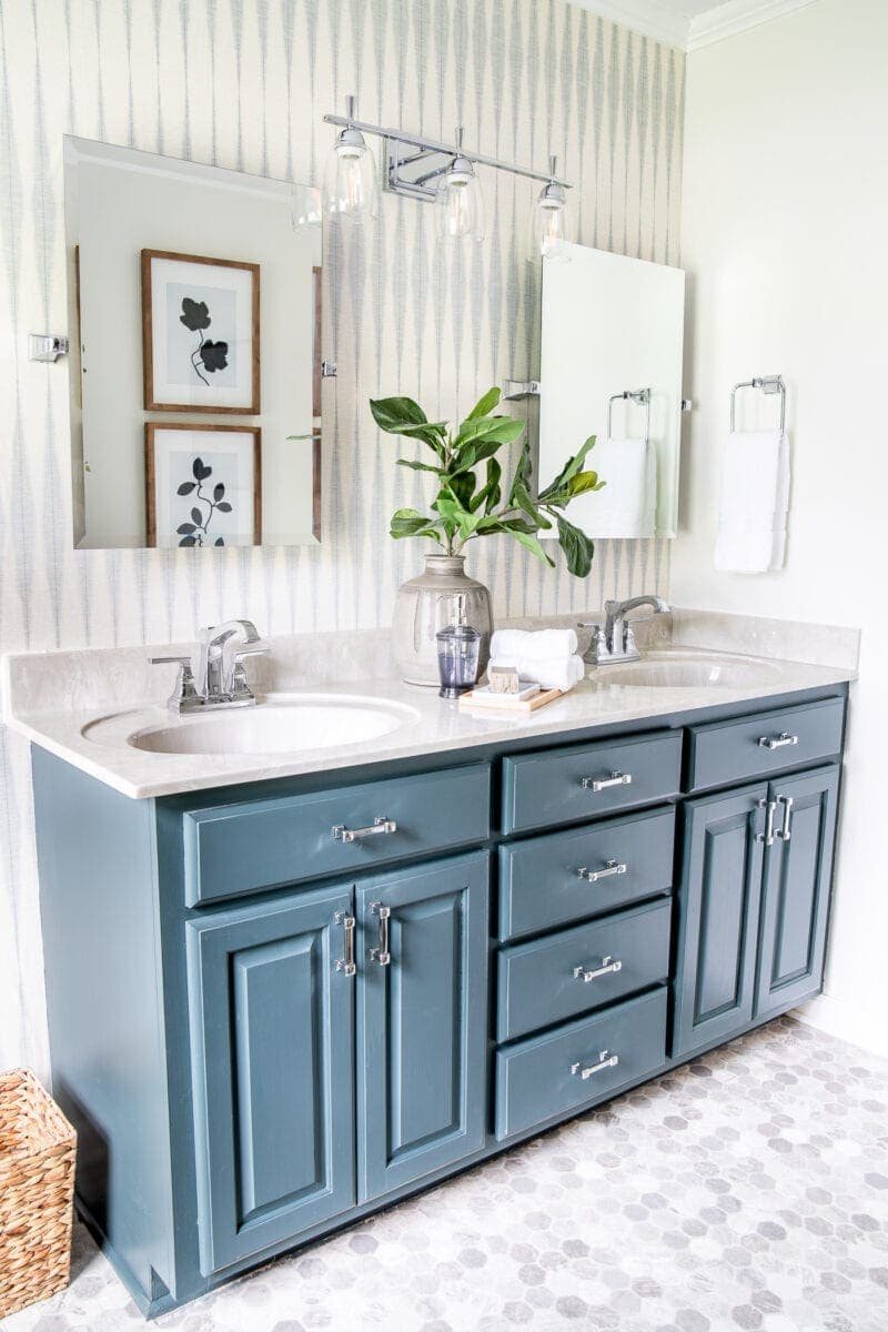 bathroom refresh with hexagon sheet vinyl flooring over tile