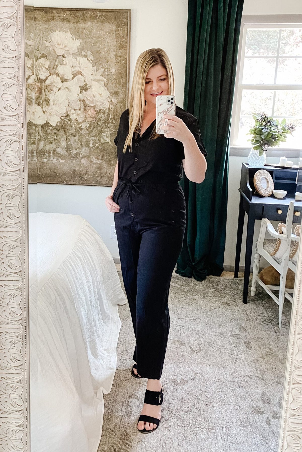 Slimming fall outfit idea: dark v-neck button front jumpsuit and heeled sandals